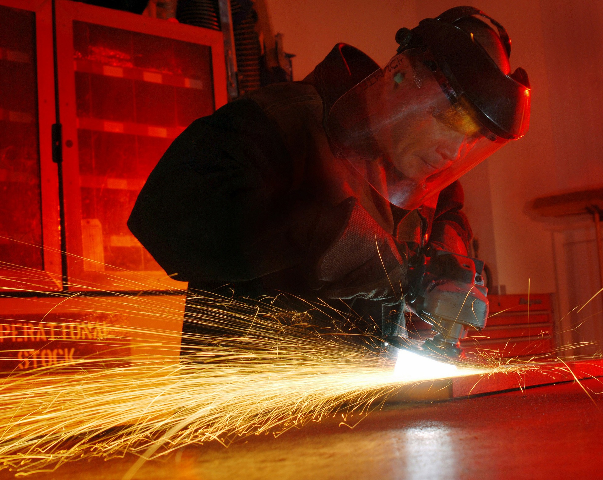 a man using orbital sander